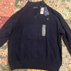 Never worn Jack Nicklaus navy blue quarter zip XXL new with tags still on.